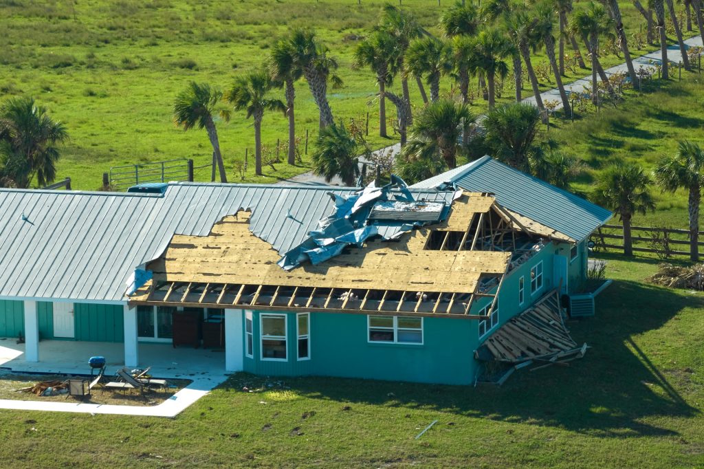 Hurricane Ian destroyed house roof in Florida residential area